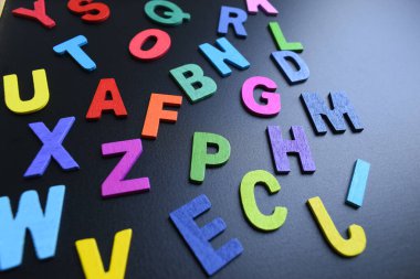 colorful letter alphabet on black background, object for education