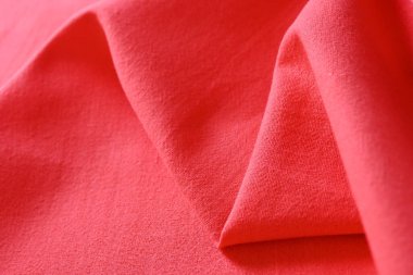 Kumaş kumaşın kırmızı dokusu, moda bezi tasarımı için soyut görüntü