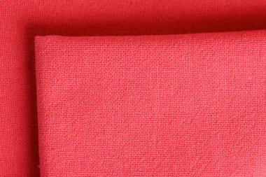 Kumaş kumaşın kırmızı dokusu, moda bezi tasarımı için soyut görüntü