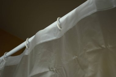 white plastic curtain texture in bathroom