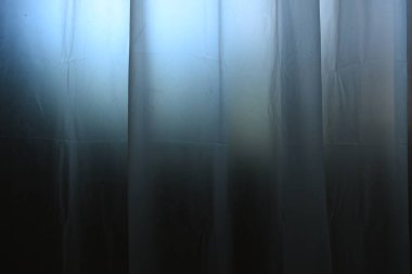 white plastic curtain texture in bathroom, scary scene