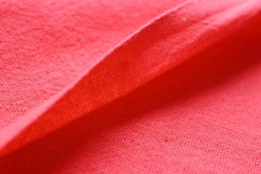 Kumaş kumaşın kırmızı dokusu, moda bezi tasarımı için soyut görüntü
