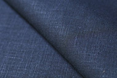 Siyah kenevir doğal kumaş kumaş rengi, tekstil modasının kaba dokusu soyut arkaplan