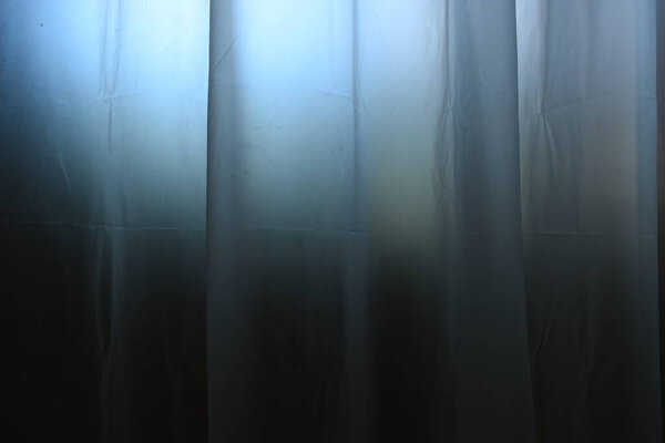white plastic curtain texture in bathroom, scary scene