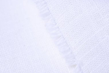 Beyaz kenevir doğal kumaş kumaş kumaş, tekstil modasının kaba dokusu soyut arkaplan