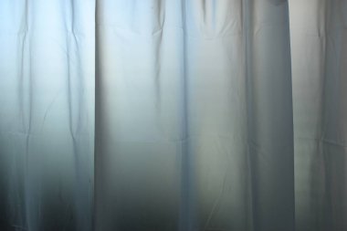 white plastic curtain texture in bathroom, scary scene