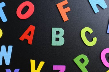 colorful letter alphabet on black background, object for education