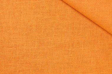 turuncu kenevir doğal kumaş kumaş rengi, tekstil modasının kaba dokusu soyut arkaplan