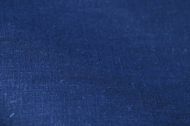 Mavi kenevir doğal kumaş kumaş rengi, tekstil moda soyut arka planının kabataslak kumaşı.