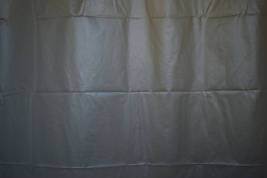 white plastic curtain texture in bathroom