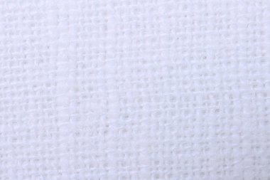 Beyaz kenevir doğal kumaş kumaş kumaş, tekstil modasının kaba dokusu soyut arkaplan