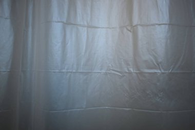 white plastic curtain texture in bathroom