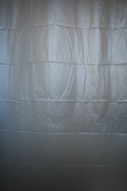 white plastic curtain texture in bathroom