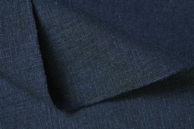 Siyah kenevir doğal kumaş kumaş rengi, tekstil modasının kaba dokusu soyut arkaplan