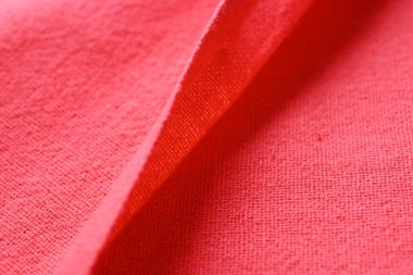 Kumaş kumaşın kırmızı dokusu, moda bezi tasarımı için soyut görüntü
