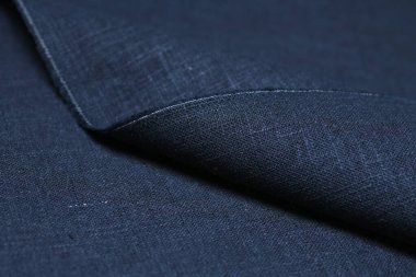 Siyah kenevir doğal kumaş kumaş rengi, tekstil modasının kaba dokusu soyut arkaplan