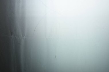 white plastic curtain texture in bathroom, scary scene