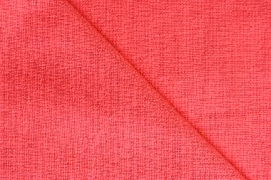 Kumaş kumaşın kırmızı dokusu, moda bezi tasarımı için soyut görüntü