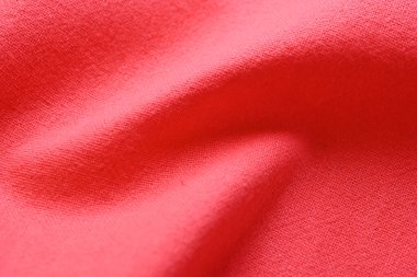Kumaş kumaşın kırmızı dokusu, moda bezi tasarımı için soyut görüntü