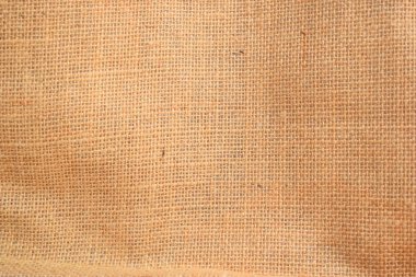 desing arkaplanı için kahverengi örülmüş çuval bezi dokusu