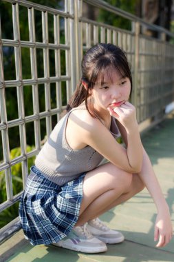 Asia Thai kızı Scott güzel giyin kız gülümse ve rahatla