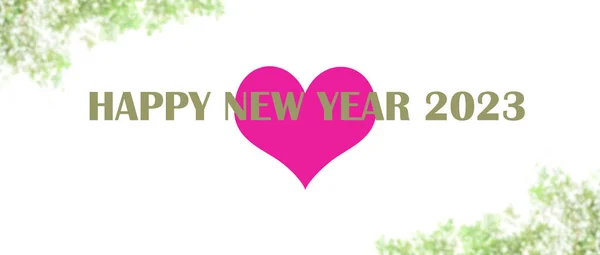 Blur tree leaves and purple heart shape behind the text happy new year 2023, white copy space