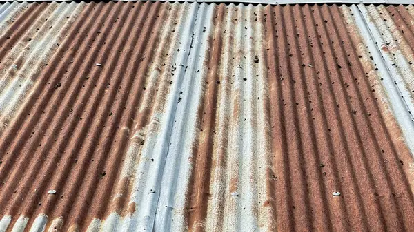 Texture of rusty galvanized metal roof sheets