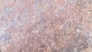 Paslı metal arkaplan görüntüsünü kapat. Metal açık bir alanda güneşin altında ve yağmurda kalır.