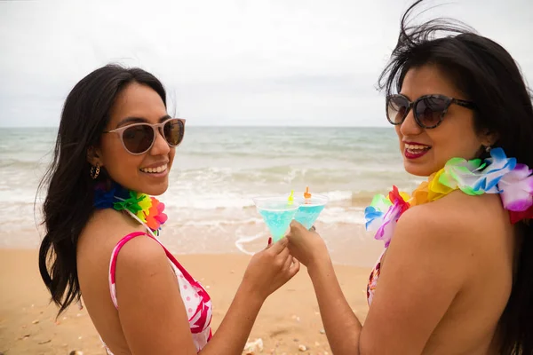 Two Young Beautiful Latin Women Glass Blue Cocktail Toast Celebrate — Φωτογραφία Αρχείου