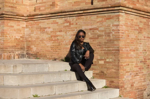 Young Beautiful Black Latin Woman Wearing Black Clothes Sunglasses Sitting — Stok fotoğraf