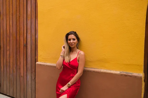 Young Blonde Beautiful Woman Red Dress Visiting Seville Woman Poses — 图库照片