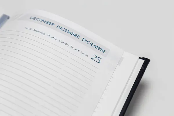 Empty page of planner calendar opened on December 25 Christmas holiday