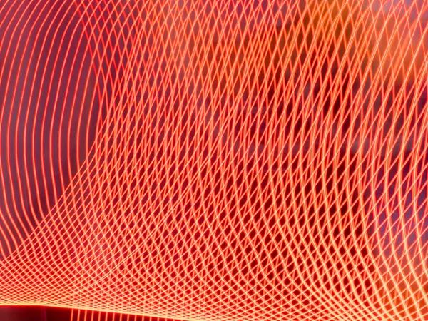 Abstract lines background. Abstract lines texture. Red and orange colors.
