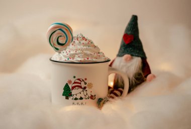 Hot chocolates surrounded with christmas decorations. Sweet hot chocolates with whipped cream. Christmas concept. clipart