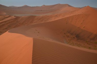 Walking on the dunes of Sossusvlei, Namibia