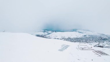 Cold Snowy Mountains in a Europe. Snowy Mountains. Winter. Armenia. Sevan, Armenia.