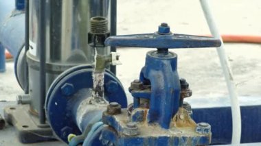 Old, rusty water pipe. Water pressure valve station plant industrial treatment purification equipment