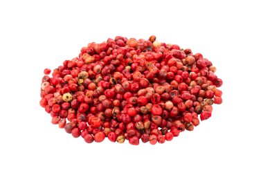 Beyaz arkaplanda izole edilmiş pembe biber tohumları.