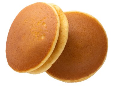 Dorayaki beyaz arka planda izole edilmiş Japon gözlemesidir.