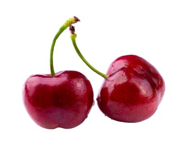 Parlak derili olgun kırmızı kirazlar beyaz arkaplanda izole edilmiş