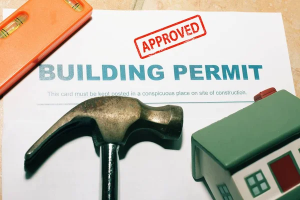 stock image Building Permit concept with approved text on a residential home