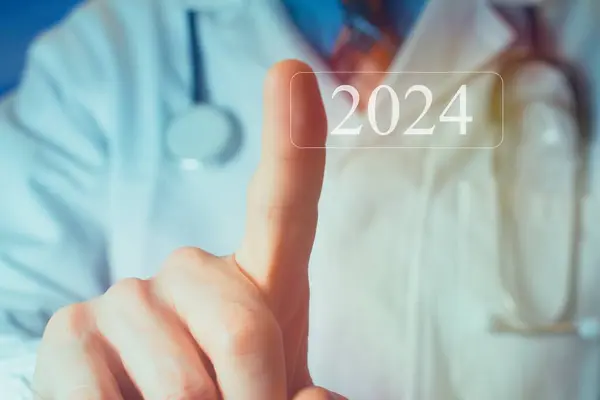 Health Care in New year 2024 Doctor in a white coat uniform healthcare medical icon, health and access to welfare health 2024 concept.