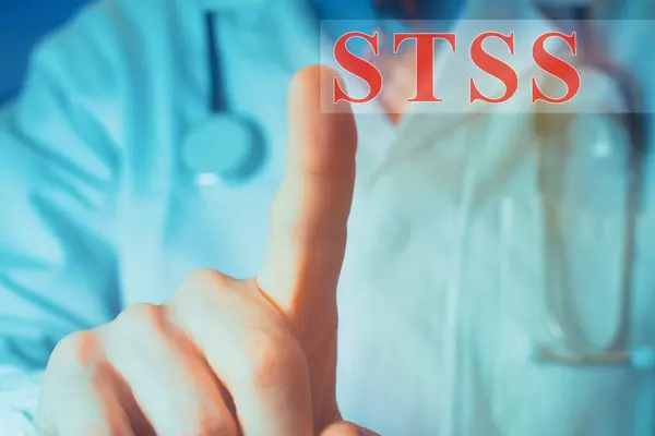 stock image Close up of a doctor pointing finger up at the word 