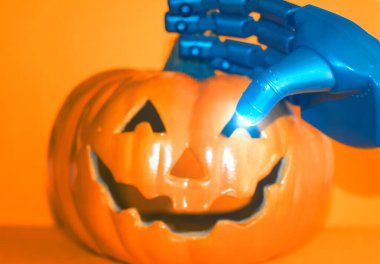 Robot Arm Holds Halloween Jack-o-Lantern, Modern Tech Meets Fall, Festive Background clipart