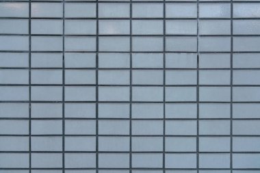 Mavi kare kiremitler, duvar sırasının arka planı ve dokusu