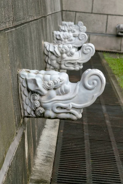 China oriental dragon stone on wall, asian historic