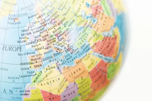 A globe with Map of Europe background