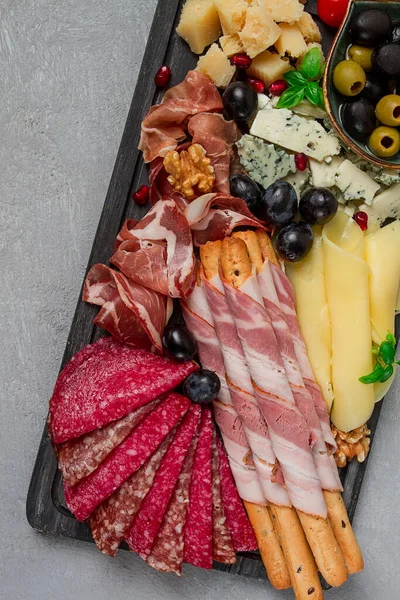 stock image Appetizer, assortment, set, sausage, and cheese, on a wooden board, top view, no people,