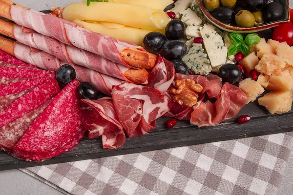 stock image Appetizer, assortment, set, sausage, and cheese, on a wooden board, top view, no people,