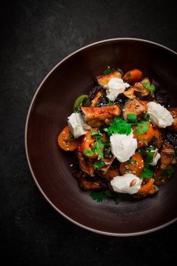 Warm Salad with crispy eggplant and tomatoes, cottage cheese, spices, herbs, sesame seeds, sunflower seeds, Georgian cuisine, no people,